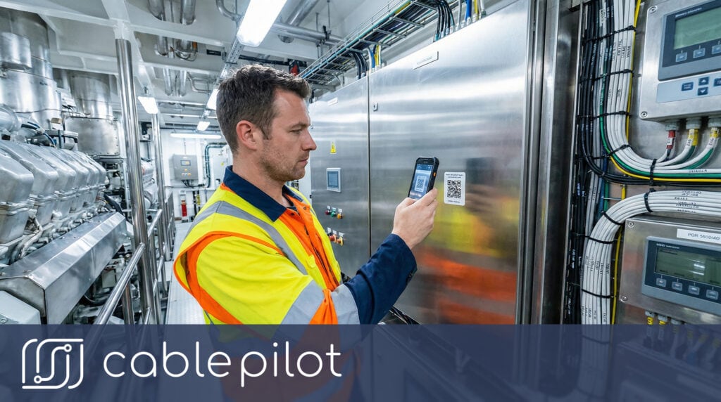 QR marking shipbuilding workflow — printed QR labels ready for application to cables and equipment